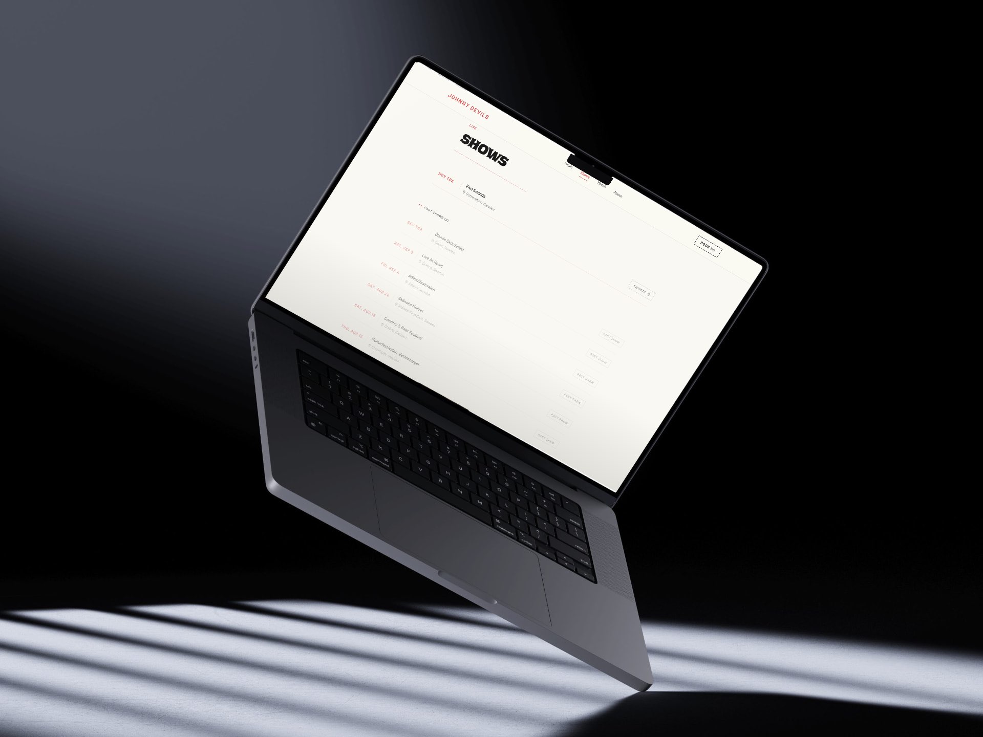 A floating MacBook showing the shows page on johnnydevils.com: Viva Sounds with a ticket link, then the summer festivals