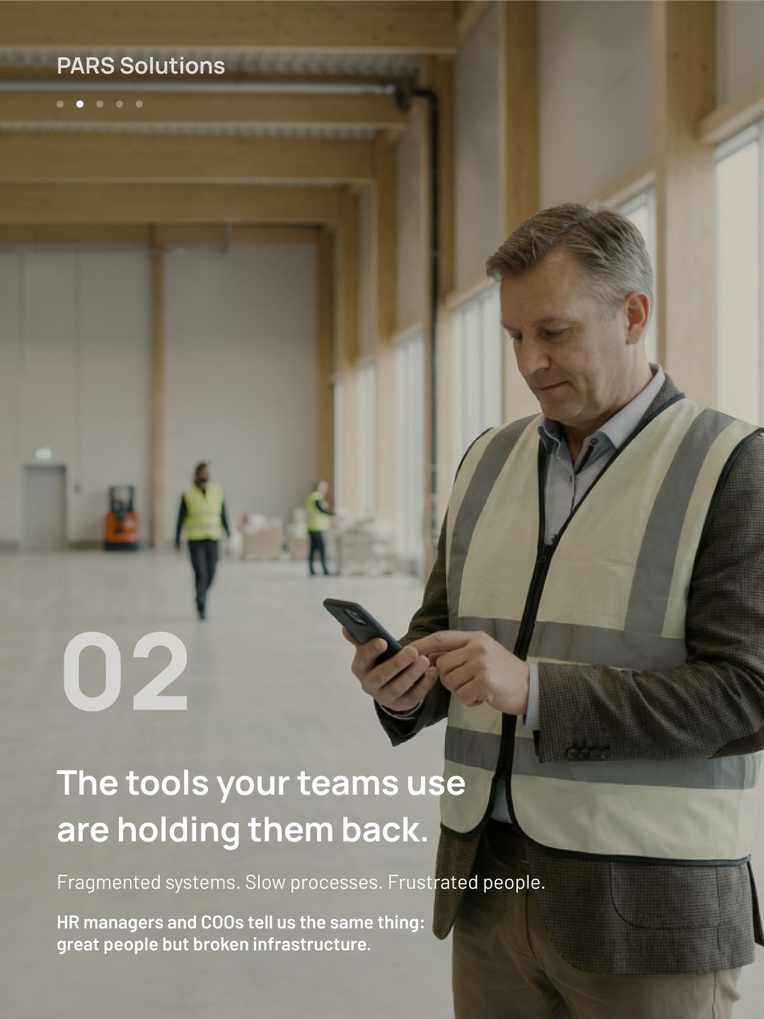 LinkedIn slide 2 for PARS: a man in a hi-vis vest reading his phone, The tools your teams use are holding them back.