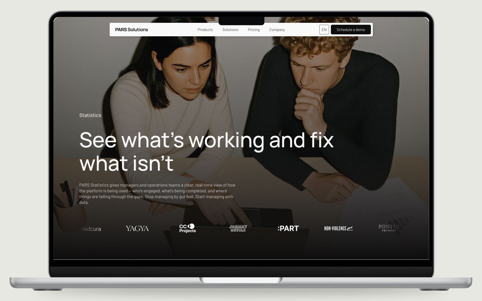 The PARS Statistics page on a MacBook: See what's working and fix what isn't, two colleagues reading a laptop, logos below
